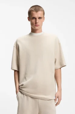 T-Shirt aus Baumwoll-Jersey mit blauem Logo-Aufnäher