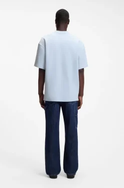 T-Shirt aus Baumwoll-Jersey mit blauem Logo-Aufnäher