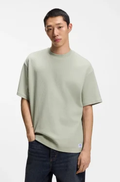 T-Shirt aus Baumwoll-Jersey mit blauem Logo-Aufnäher