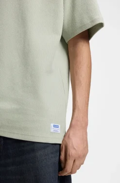 T-Shirt aus Baumwoll-Jersey mit blauem Logo-Aufnäher