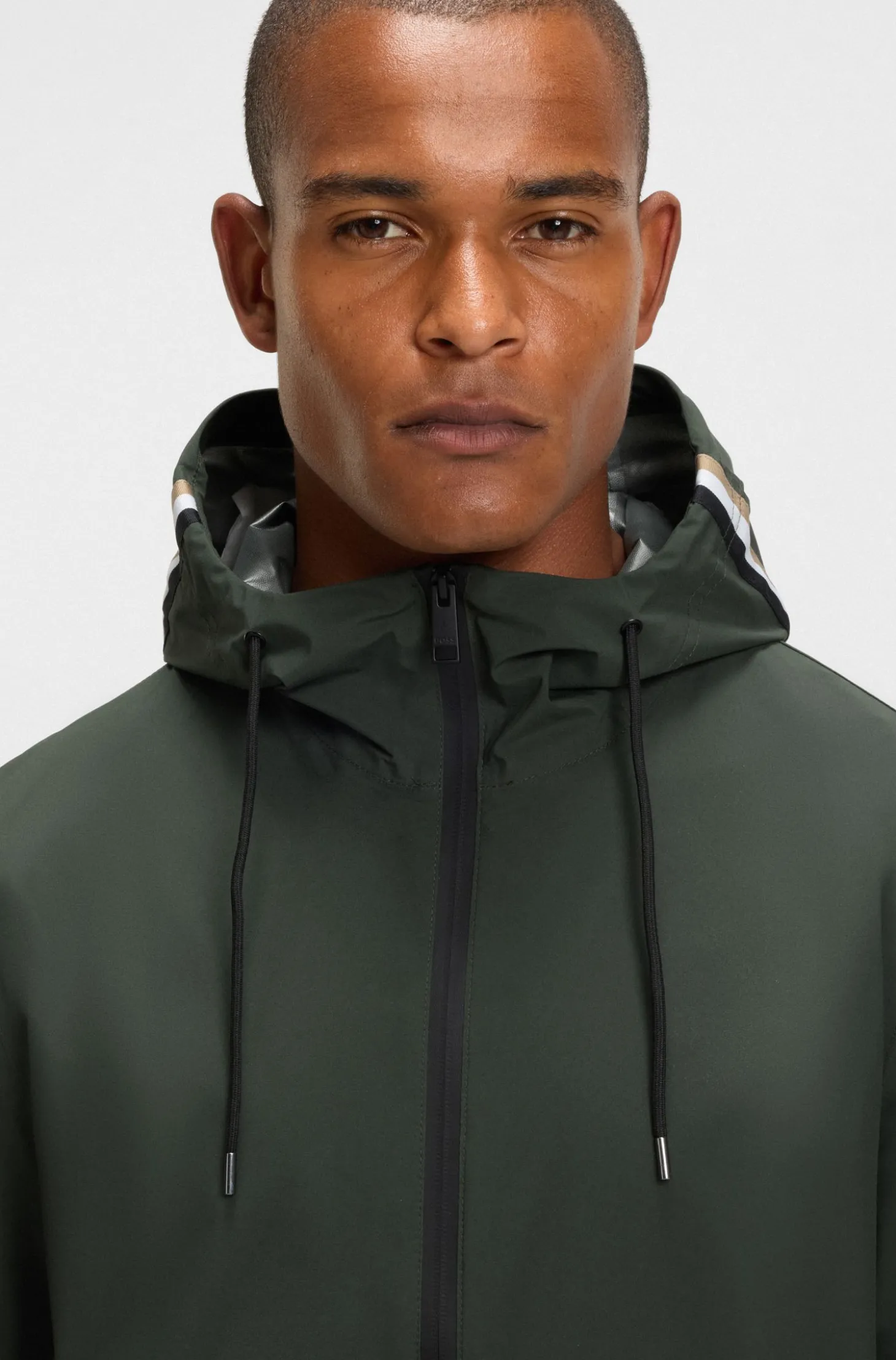 Wasserdichte Reitsport-Jacke mit verstellbarer Kapuze