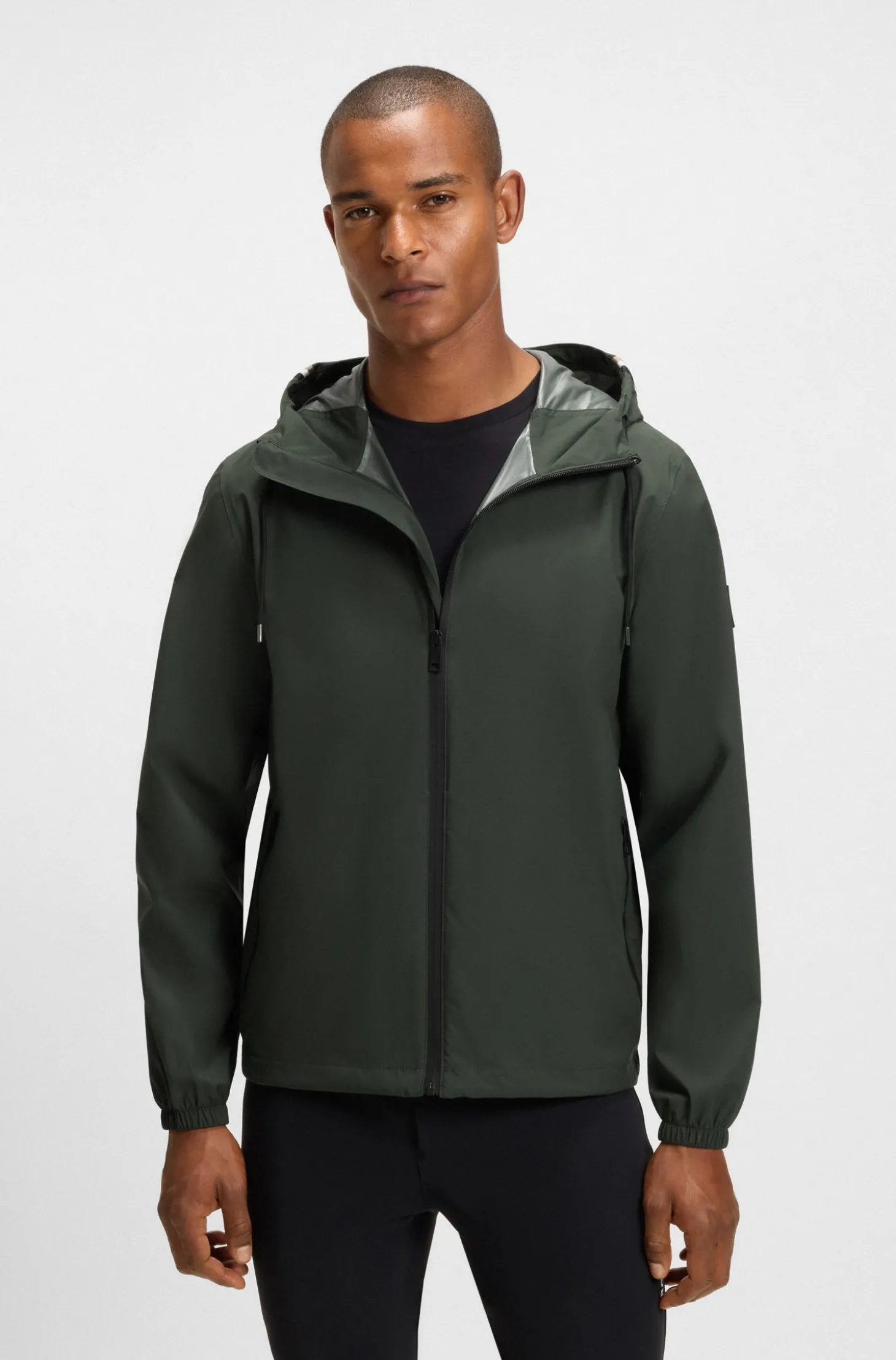 Wasserdichte Reitsport-Jacke mit verstellbarer Kapuze