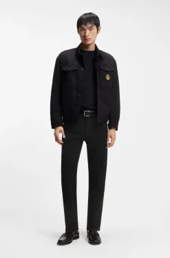Year of the Horse Tapered-Fit Jeans aus schwarzem Denim mit gelasertem Muster
